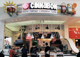 restaurant signage with cinnamin rolls and drinks