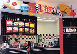 Chinese food storefront with signage faded